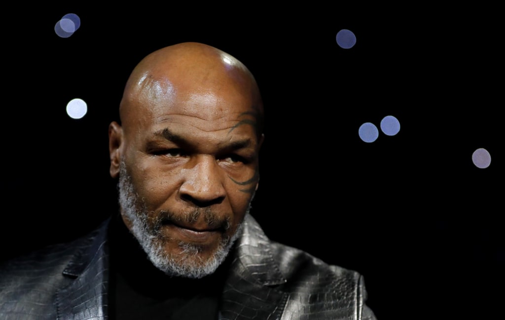 Mike Tyson cries as he reveals he feels empty after retiring from boxing